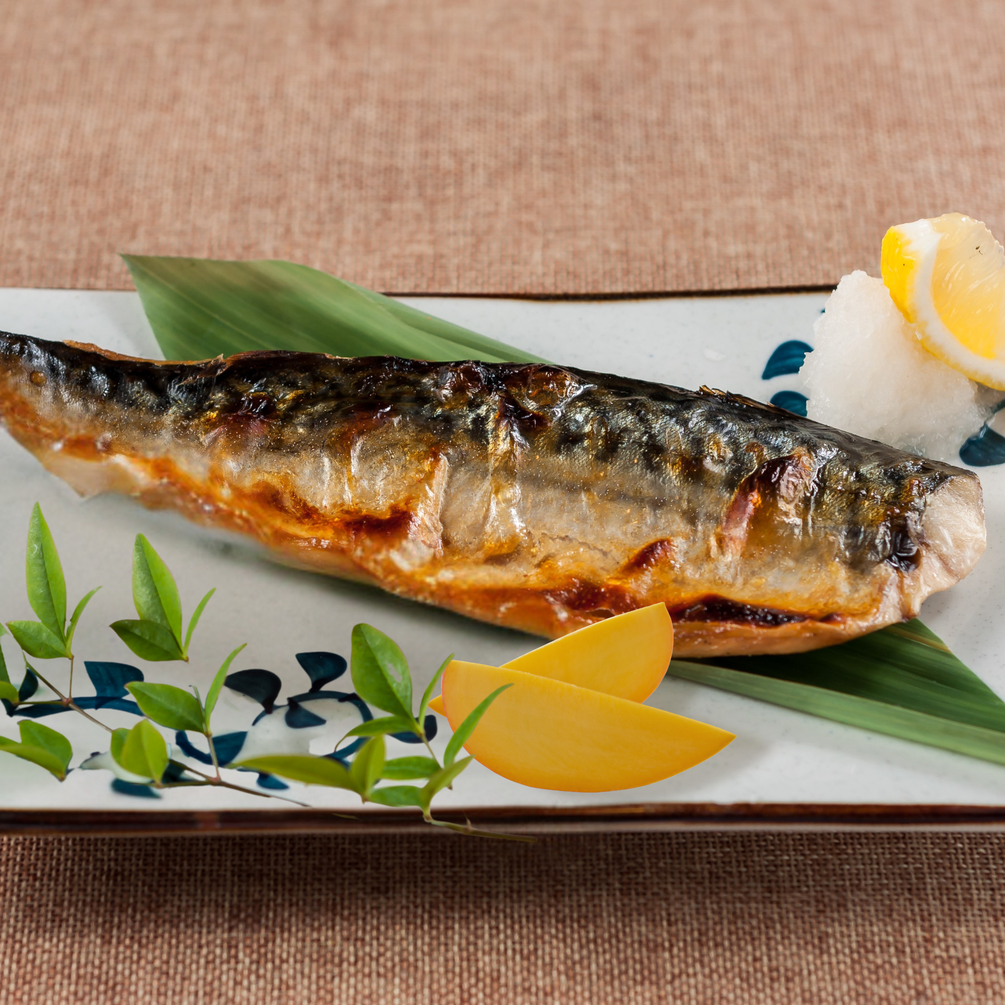 Grilled mackerel fillets, mango, hazelnuts and coffee oil