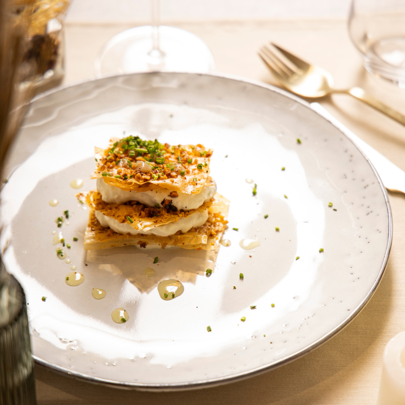 Millefeuille de Noël : poivre, roquefort, noix et huile d'olive et cèpes